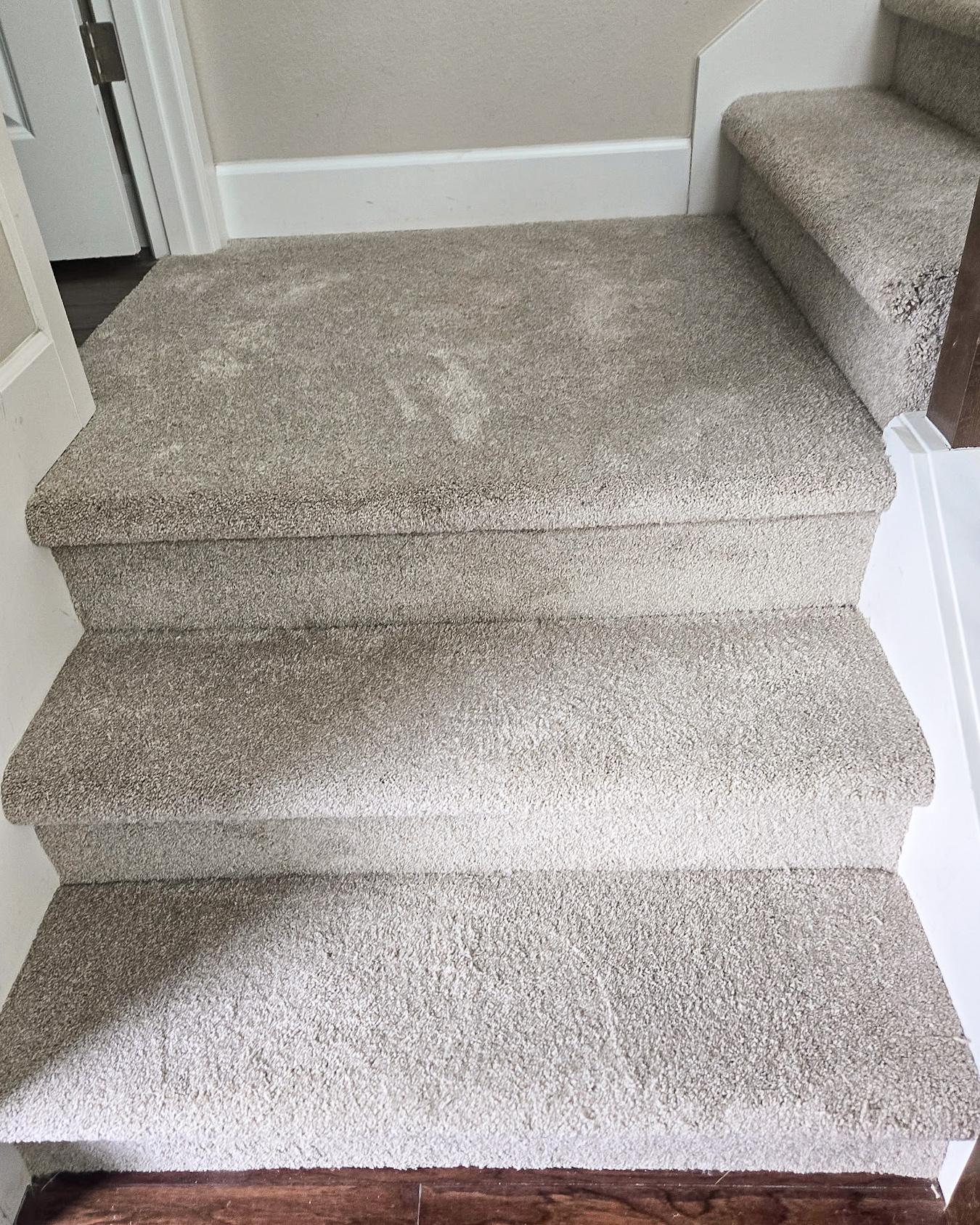 Carpeted stair landing detail